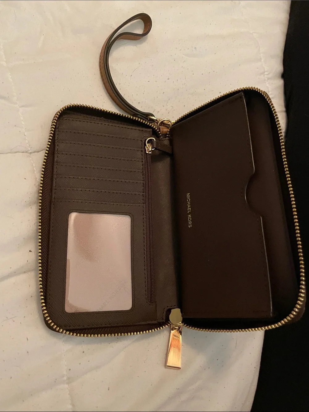 Michael Kors Brown Monogram Wristlet with Gold Plate